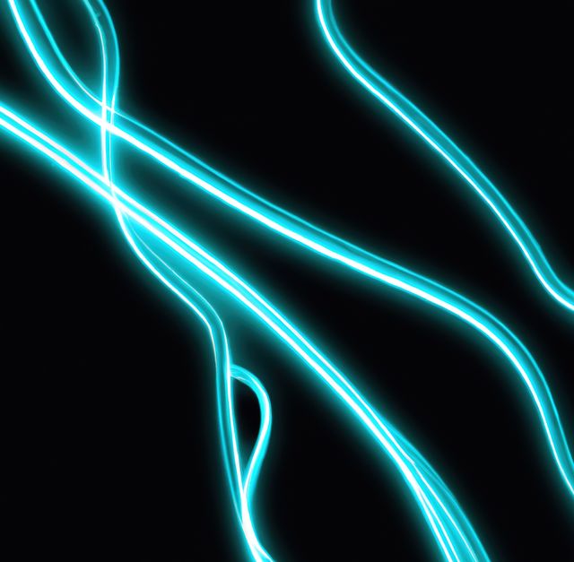 Close up of blue neon lines on black backrgound. Abstract backrgound, light and pattern concept.