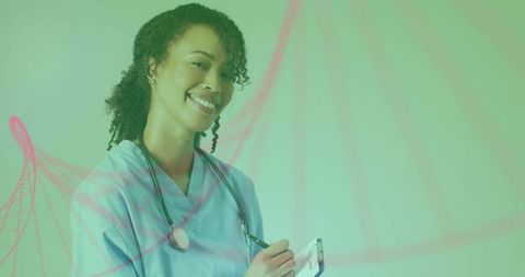 Smiling Female Nurse Holds Clipboard for Wellness Notes