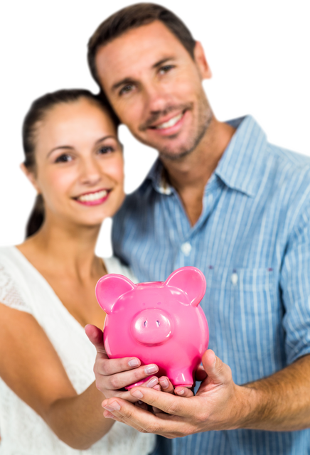 Happy Couple Holding Piggy Bank Against Isolated White Background - Download Free Stock Videos Pikwizard.com