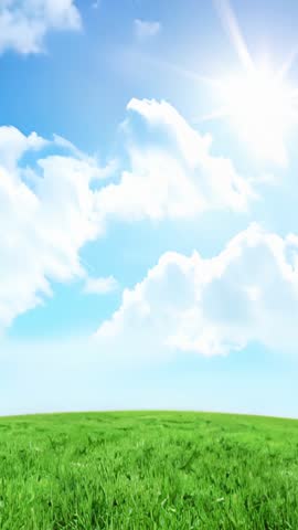 Sun Flaring Over Rippling Green Hillside, Clouds Drifting, Time Passing Vertical Video