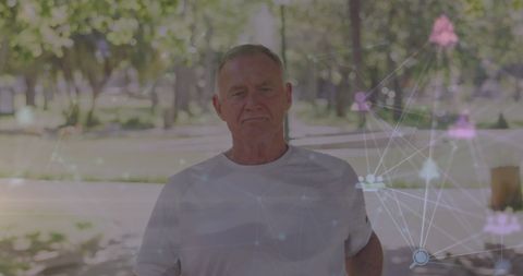 Senior Man Exercising Outdoors with Digital Network Overlay