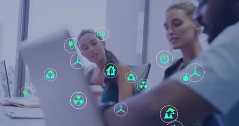 Team Collaborating on Sustainable Energy Planning with Digital Tablets