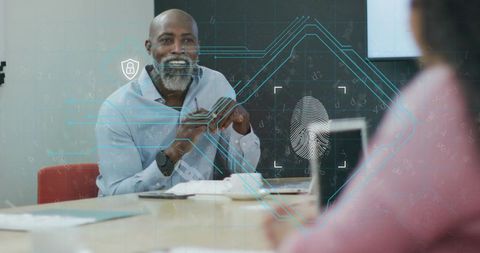 It consultant discussing biometric security in office setting