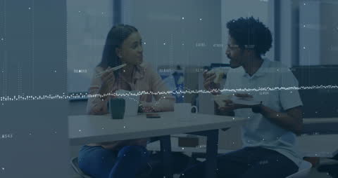 Coworkers Discussing Ideas in Modern Office with Digital Data Overlay