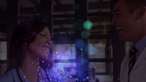 Animated Light Spots Over Smiling Diverse Doctors in Hospital