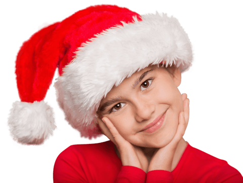 Smiling biracial child wearing santa hat transparent background