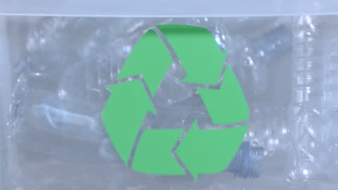 Plastic Bottle Dropping in Recycle Bin with Symbol