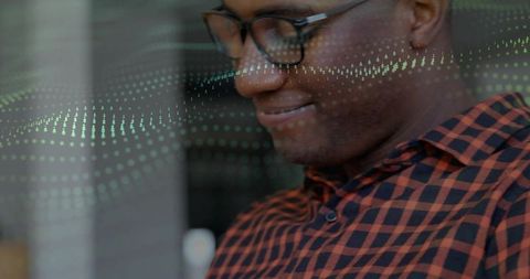 Man analyzing digital data in tech workspace