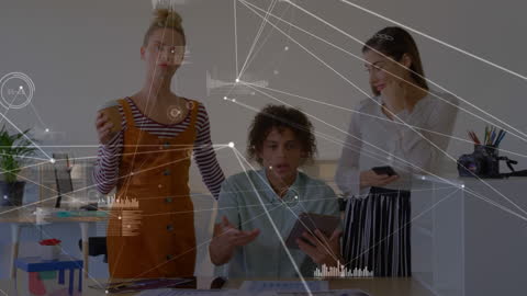 Diverse Coworkers Networking in Modern Office with Digital Connections