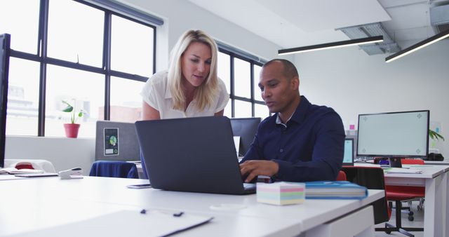 Business People Collaborating on Laptop in Modern Office - Download Free Stock Images Pikwizard.com