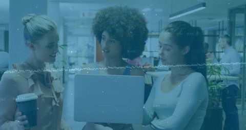 Women Entrepreneurs Collaborating in Modern Open Office Environment