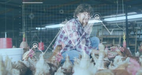 Farmhand inspecting flock of chickens in barn with digital analytics overlay tracking metrics