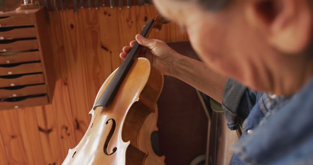 Close-up of Luthier Working on Violin Crafting in Wood Workshop - Download Free Stock Images Pikwizard.com