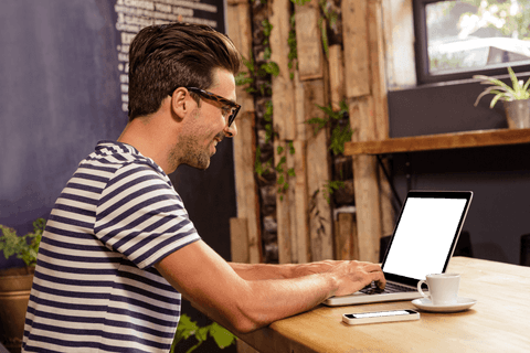Transparent Bootstrap Enjoying Coffee at Cozy Cafe with Laptop - Download Free Stock Videos Pikwizard.com