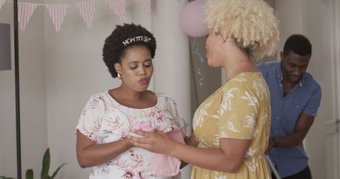 Women Celebrating at Gender Reveal Party