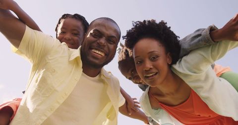 Joyful African American Family Outdoors Connecting Under Clear Sky - Download Free Stock Images Pikwizard.com