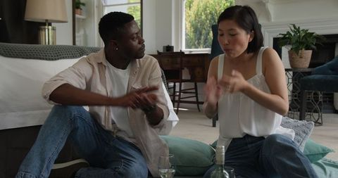 Couple Communicating through Sign Language at Home