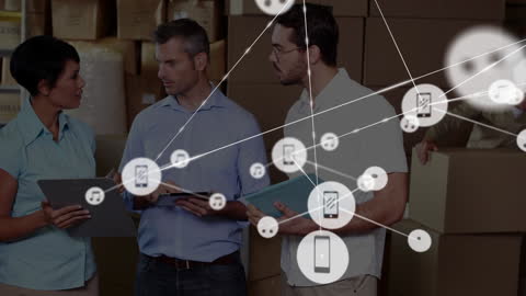 Warehouse Team Collaborating Over Wireless Technology