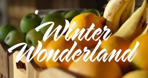 Winter wonderland text overlay on fresh fruit display