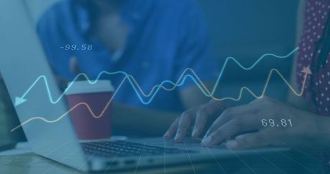 Professionals Analyzing Digital Chart with Laptop in Modern Office