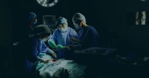 Team of Surgeons Performing Complex Hospital Surgery