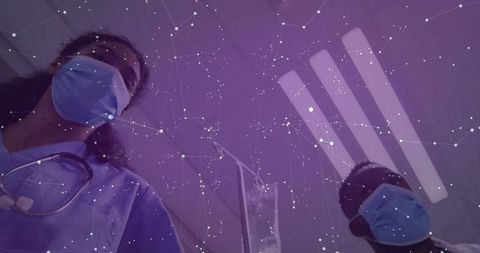 Healthcare Professionals Wearing Masks in Connected Hospital Environment