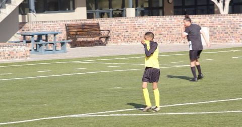 Soccer Players in Action During Unofficial Training Session