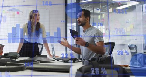 Data Analysis Meeting in Modern Office with Holographic Charts