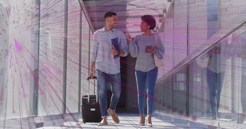 Business Professionals Engaged in Office Corridor Discussion