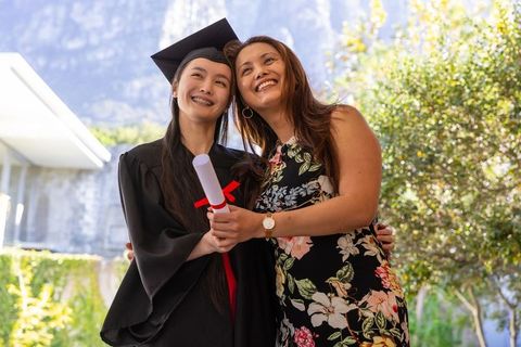 Proud Mother and Daughter at Graduation Ceremony Outdoor
