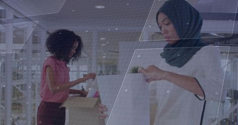 Coworkers Collaborating in Modern Technology Workspace