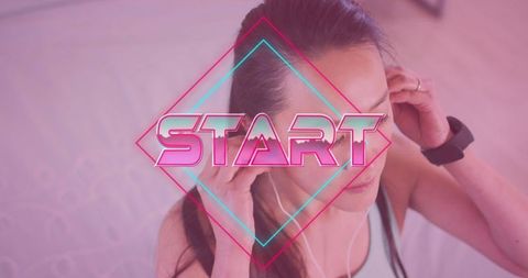 Woman Preparing for Start of Fitness Challenge with Headphones