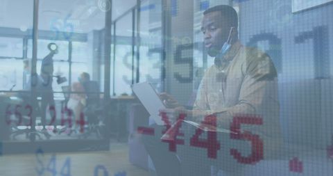 Business Professional Analyzing Financial Data During Pandemic