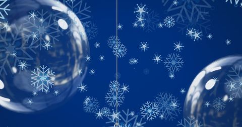 Floating Snowflakes and Christmas Baubles on Blue Background - Download Free Stock Images Pikwizard.com