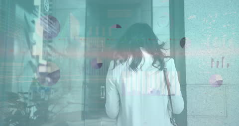 Woman Entering Office Overlaid with Financial Data Graphics