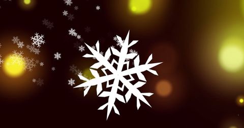 Snowflakes Falling on Glowing Yellow Light Background
