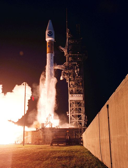 Rocket lifting off from Pad A at Cape Canaveral Air Force Station carrying the NASA/NOAA weather satellite GOES-L. Image captures the dynamic launch of Atlas II/Centaur rocket at 3:07 a.m. EDT. Ideal for use in space exploration articles, weather satellite presentations, aeronautics education materials, and promotional content for scientific advancements.