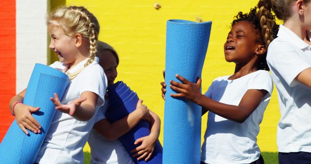 Diverse Children Holding Yoga Mats Outside - Download Free Stock Images Pikwizard.com