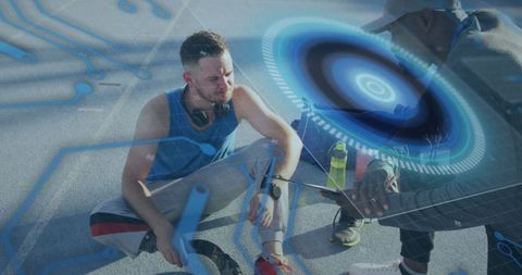 Disabled sportsman analyzing fitness data with coach