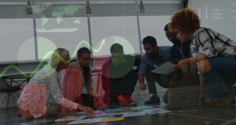 Team Analyzing Data with Digital Overlay in Office Setting