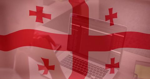 Georgian Flag Overlaid on Office Workspace with Laptop and Business Elements - Download Free Stock Images Pikwizard.com