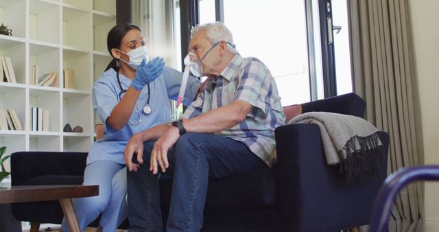 Healthcare Worker Assisting Senior Man with Oxygen Mask at Home - Download Free Stock Images Pikwizard.com