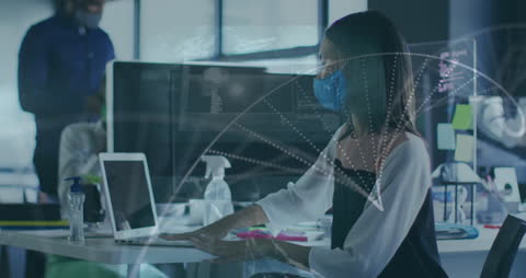 Businesswoman with Face Mask Analyzing Data Visualization