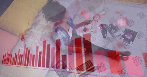 Businesswoman Analyzing Data with Overlaid Graphs and Charts at Home