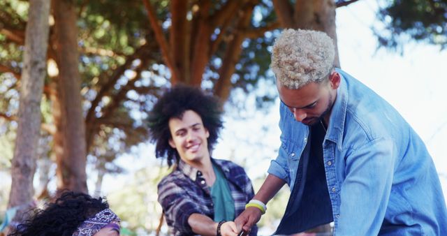 Multiracial Friends Having Fun at Outdoor Picnic - Download Free Stock Images Pikwizard.com