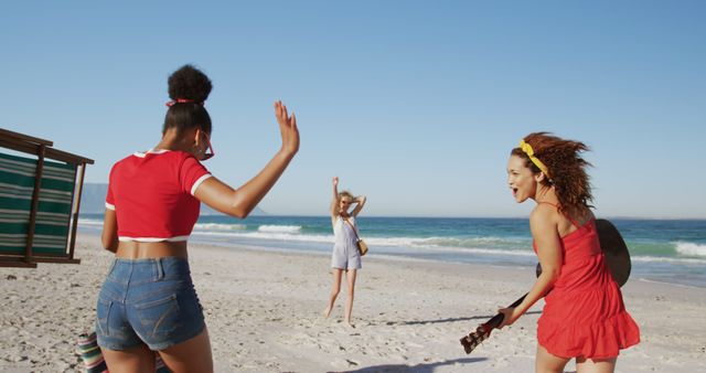 Friends Enjoying Beach with Guitar on Sunny Day - Download Free Stock Images Pikwizard.com