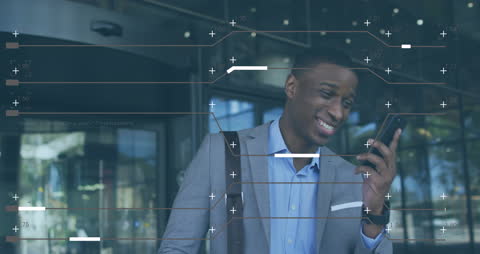 African American Businessman Discussing on Phone Amid Data Overlay