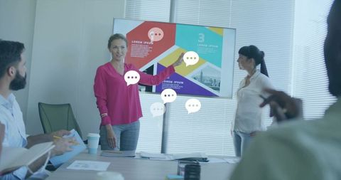 Professional team discusses infographic in high-tech boardroom