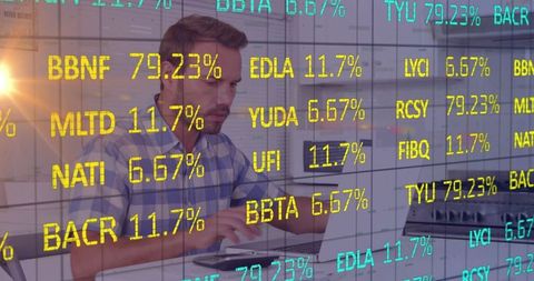 Businessman Analyzing Stock Market Trends on Laptop with Data Overlay - Download Free Stock Images Pikwizard.com