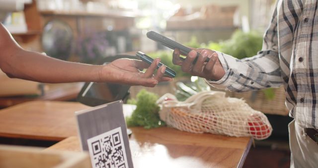 Person Making Contactless Payment with Smartphone at Farmers Market - Download Free Stock Images Pikwizard.com